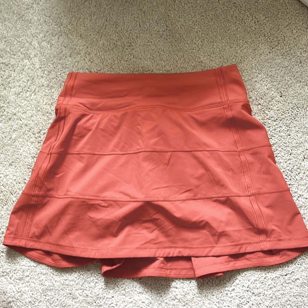 Orange Lululemon Pace rival skirt